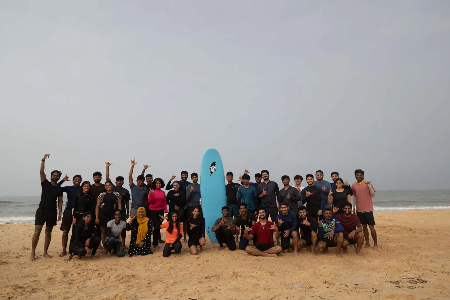 Surf-school community group on the beach